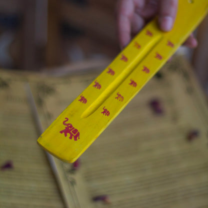 Yellow wooden Incense Stick Holder with the print of Elephant