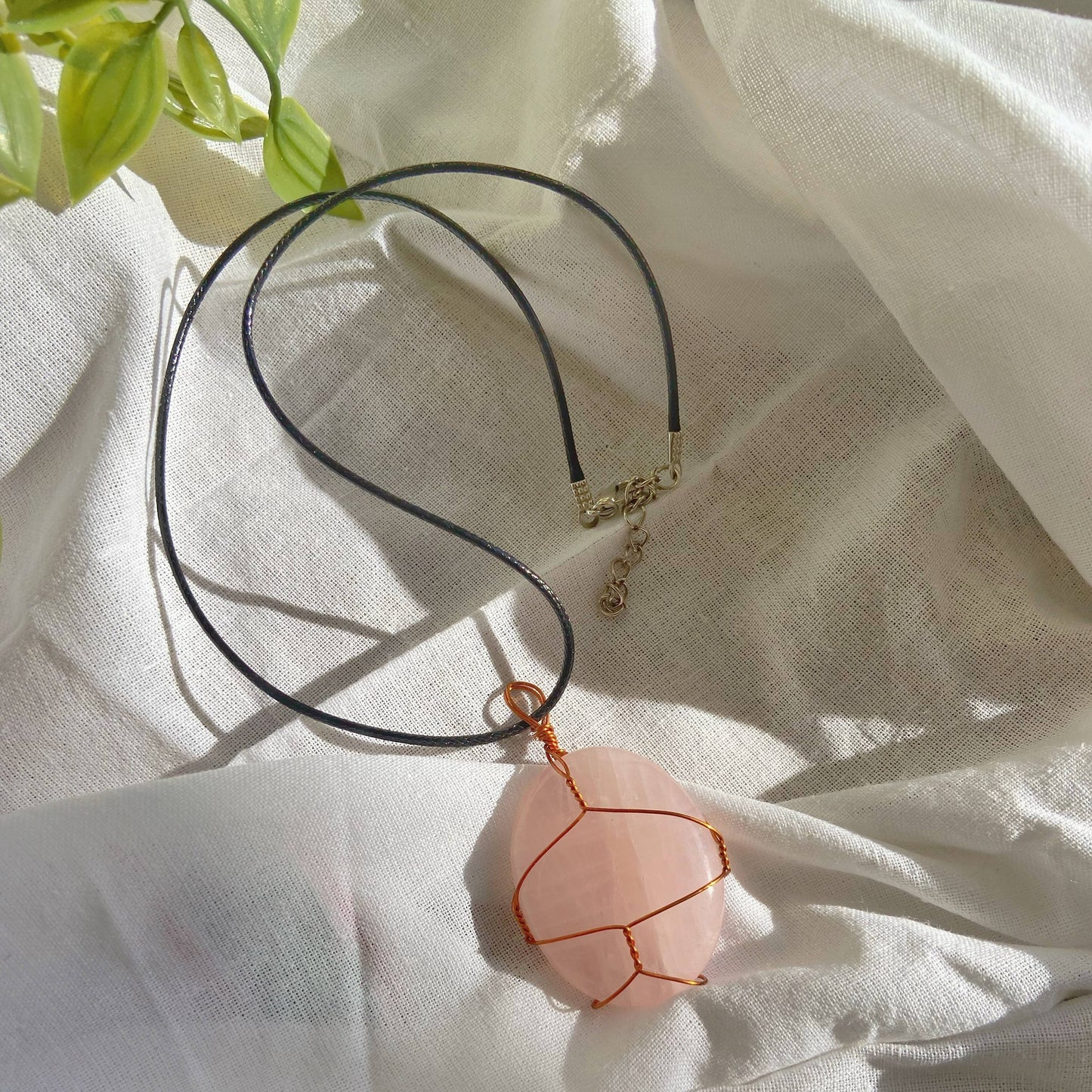 Rosequartz Palm Pendant With Cord Crystal & Stones