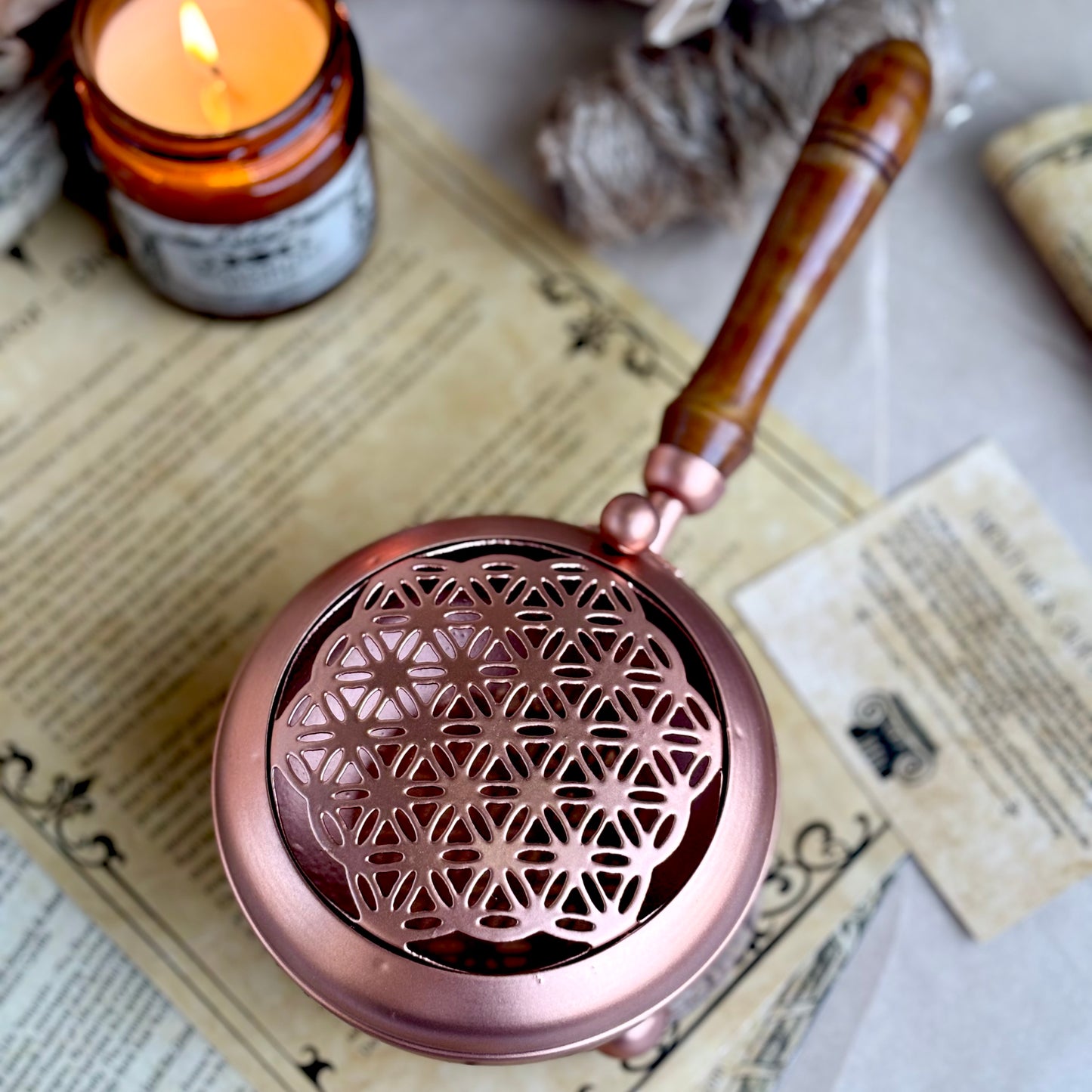 Flower of Life Iron Incense Holder with Rose Gold finish and wooden handle