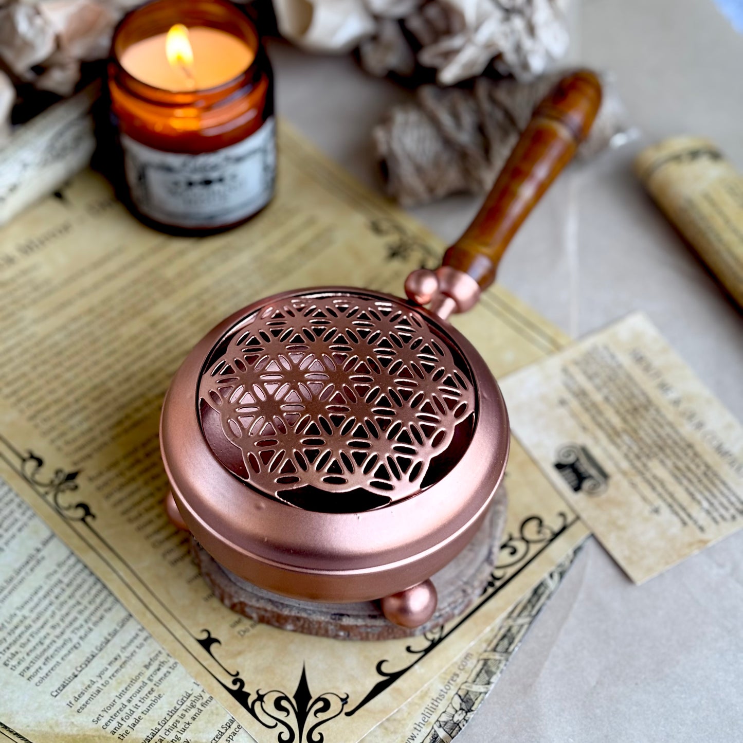 Flower of Life Iron Incense Holder with Rose Gold finish and wooden handle