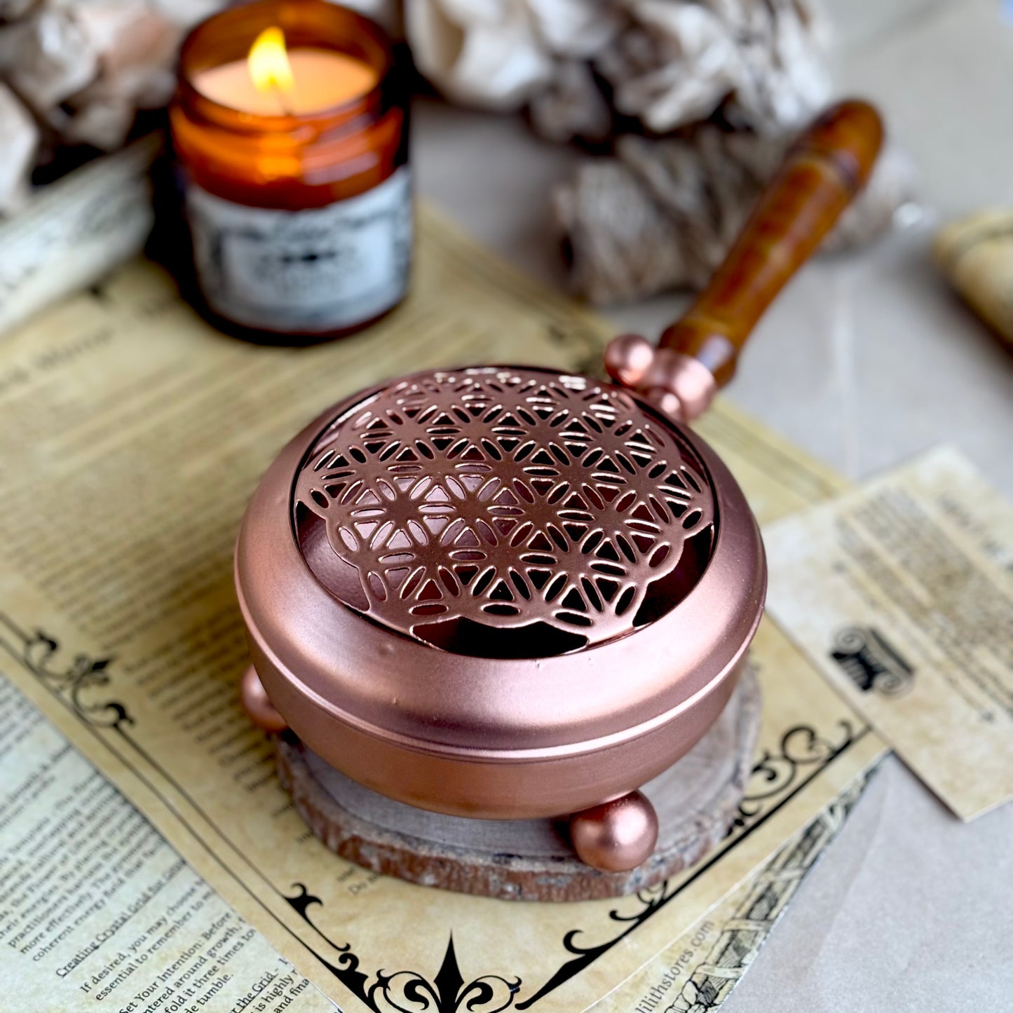 Flower of Life Iron Incense Holder with Rose Gold finish and wooden handle