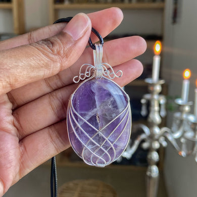 Amethyst silver wire wrapped pendant with black cord